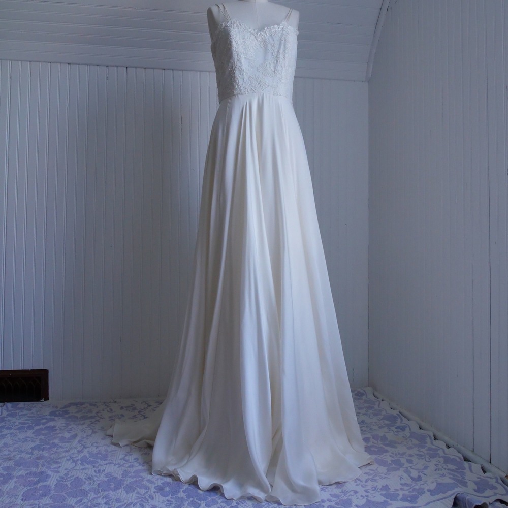 Modern Theia ivory silk romantic a-line wedding dress